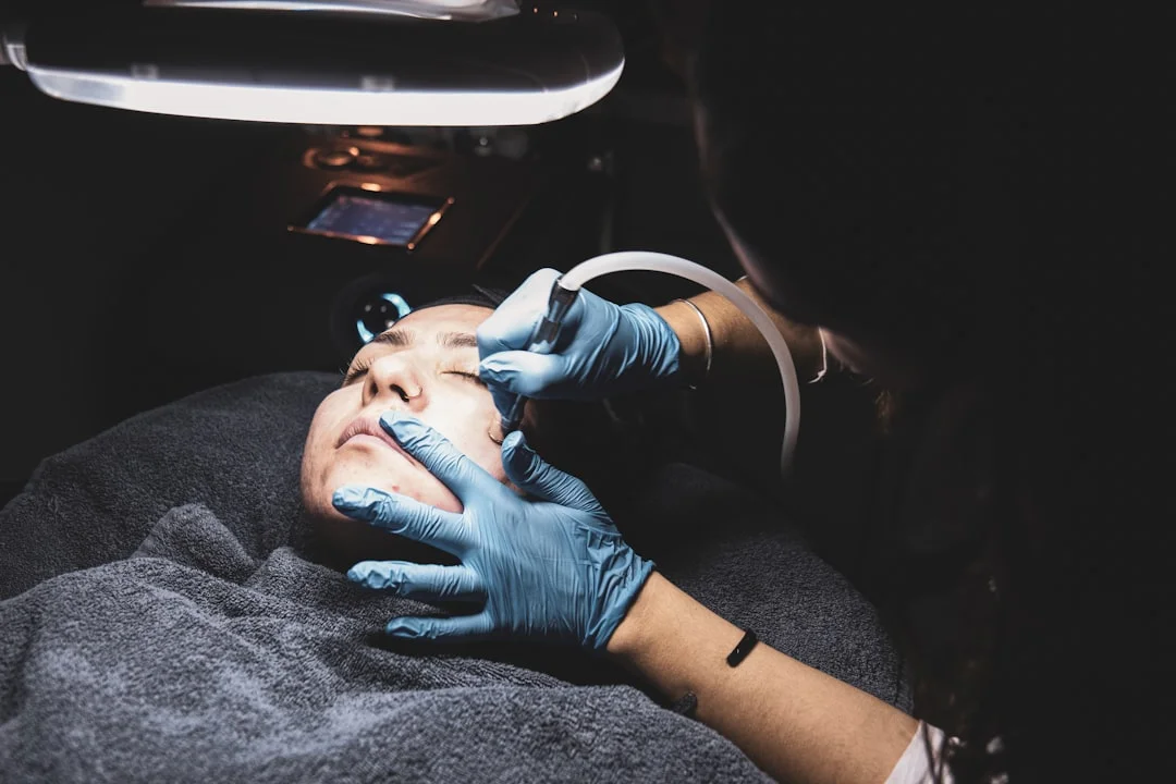 person fixing someone's face